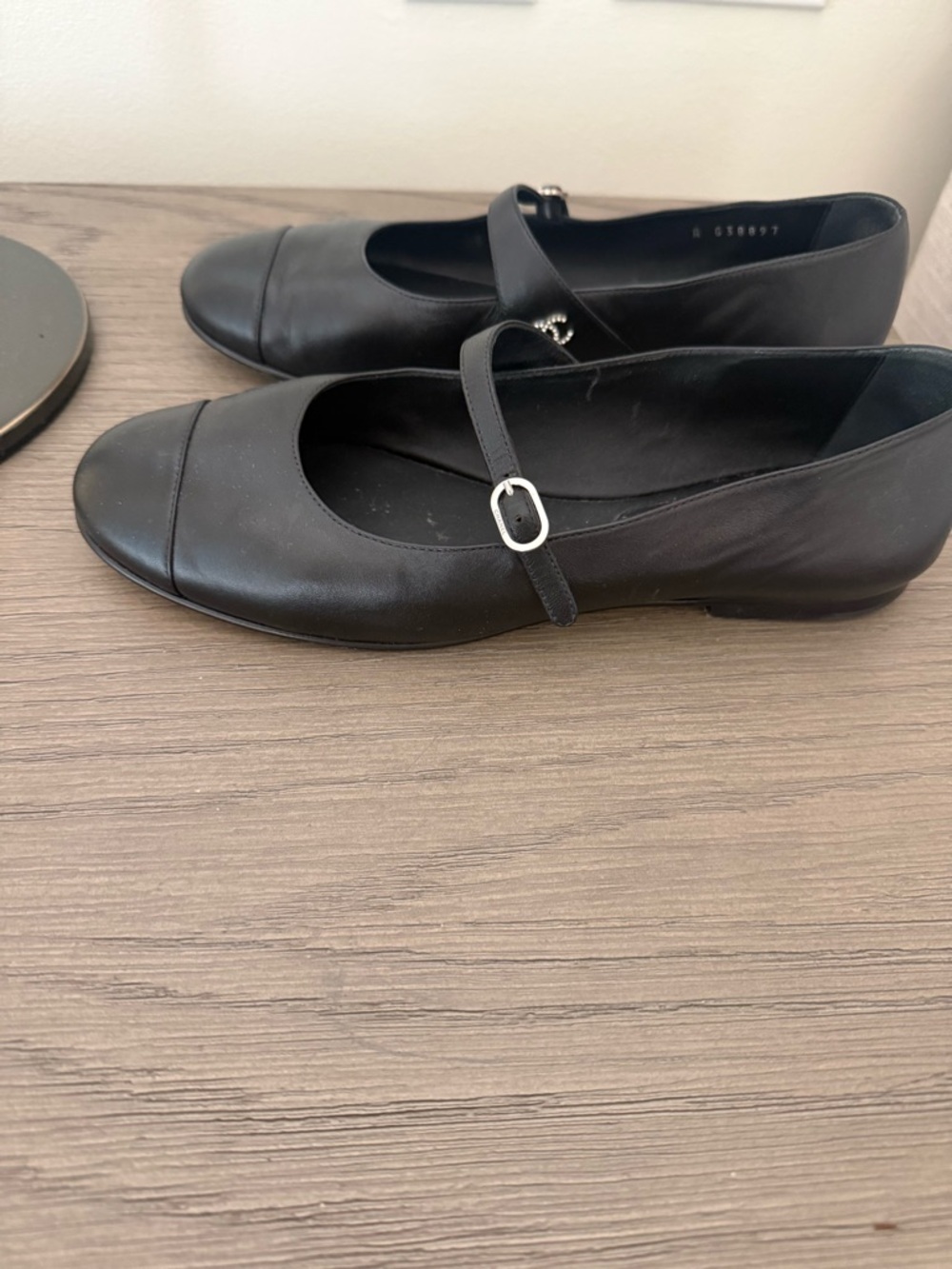 CHANEL Black Leather Mary Jane Flats with Silver Buckle